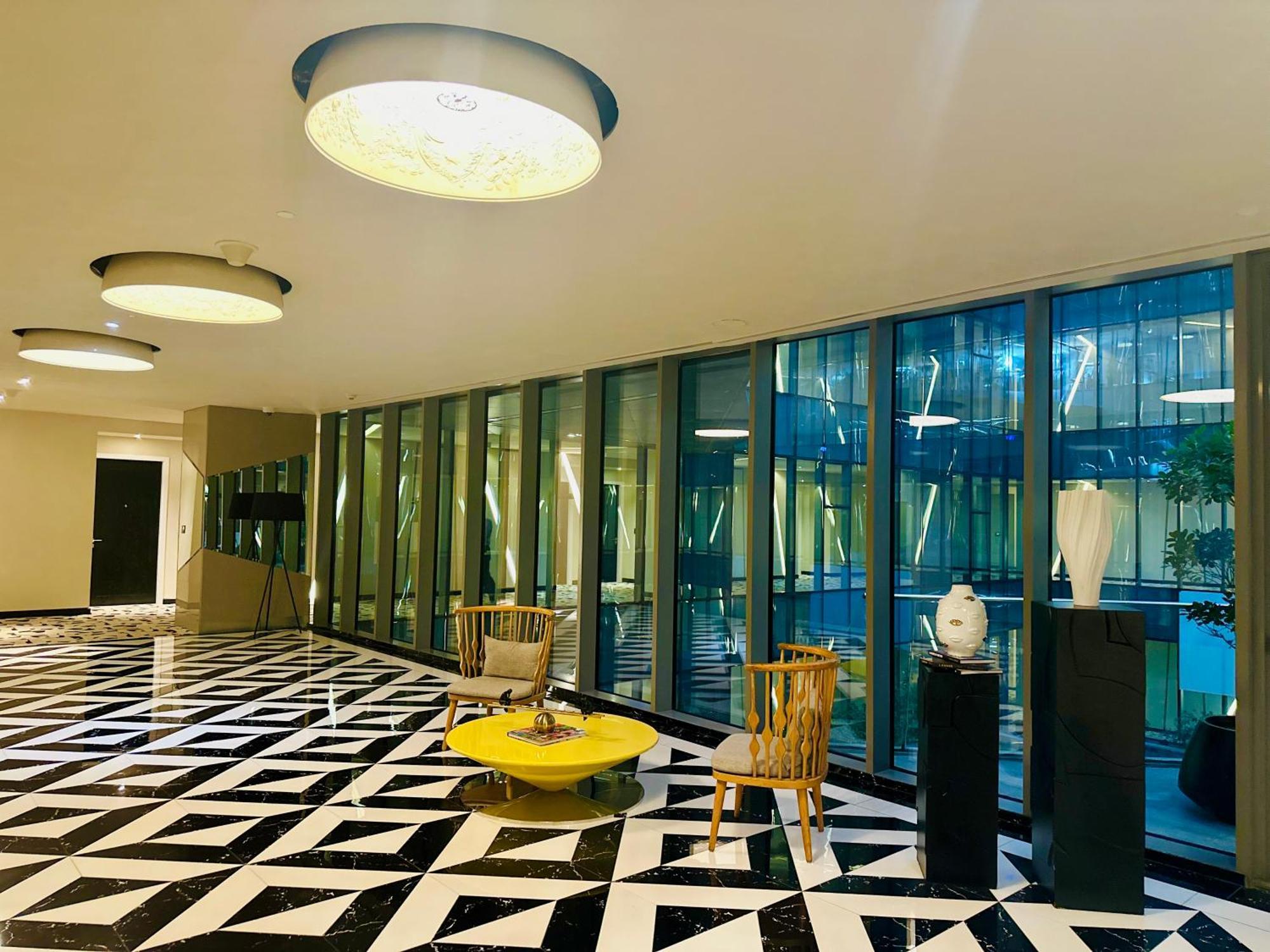 The Nishat Hotel Johar Town Lahore Exterior foto The lobby of the hotel