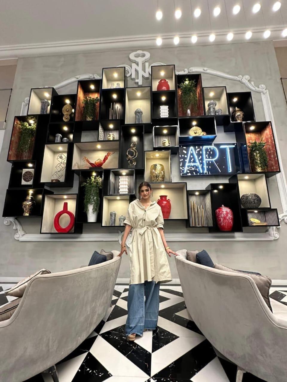 The Nishat Hotel Johar Town Lahore Exterior foto The Art Gallery at the Taj Mahal Palace